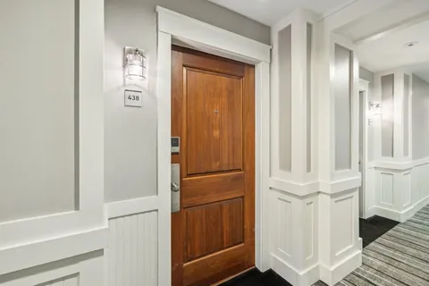 a view of front door with hallway