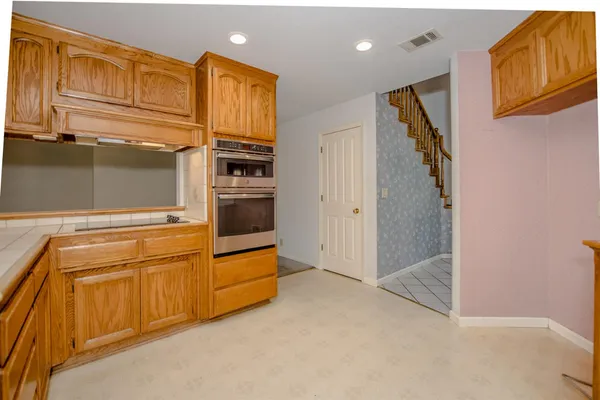 a bathroom with a tub and shower