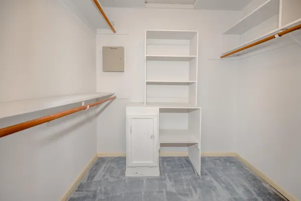 a view of an empty walk in closet