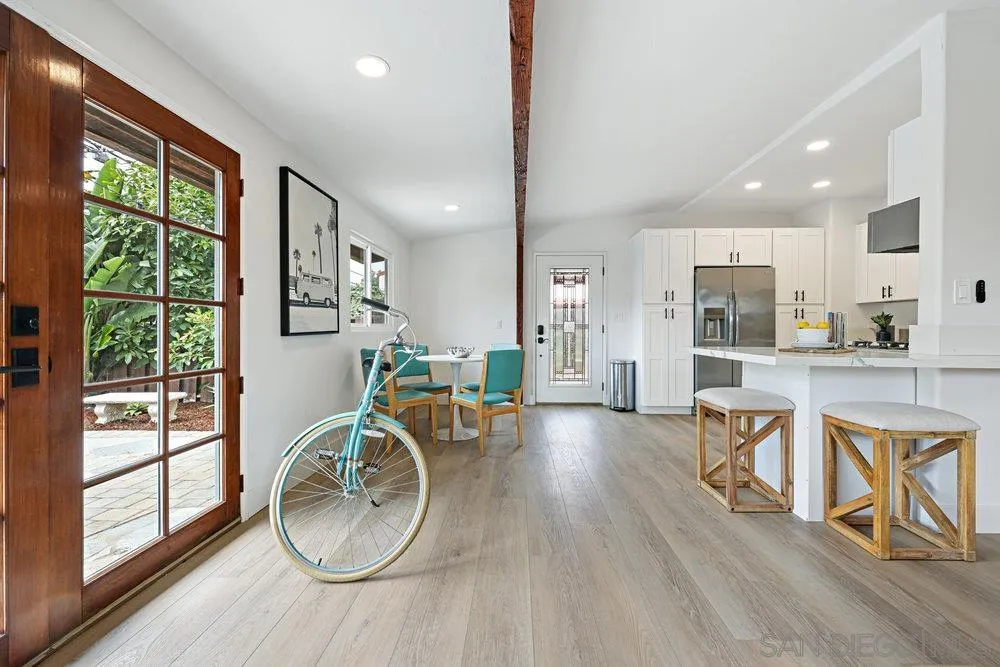 720 Valley Avenue Solana Beach, CA 92075 - Photo 9 of 12 a view of a livingroom with furniture wooden floor and a window