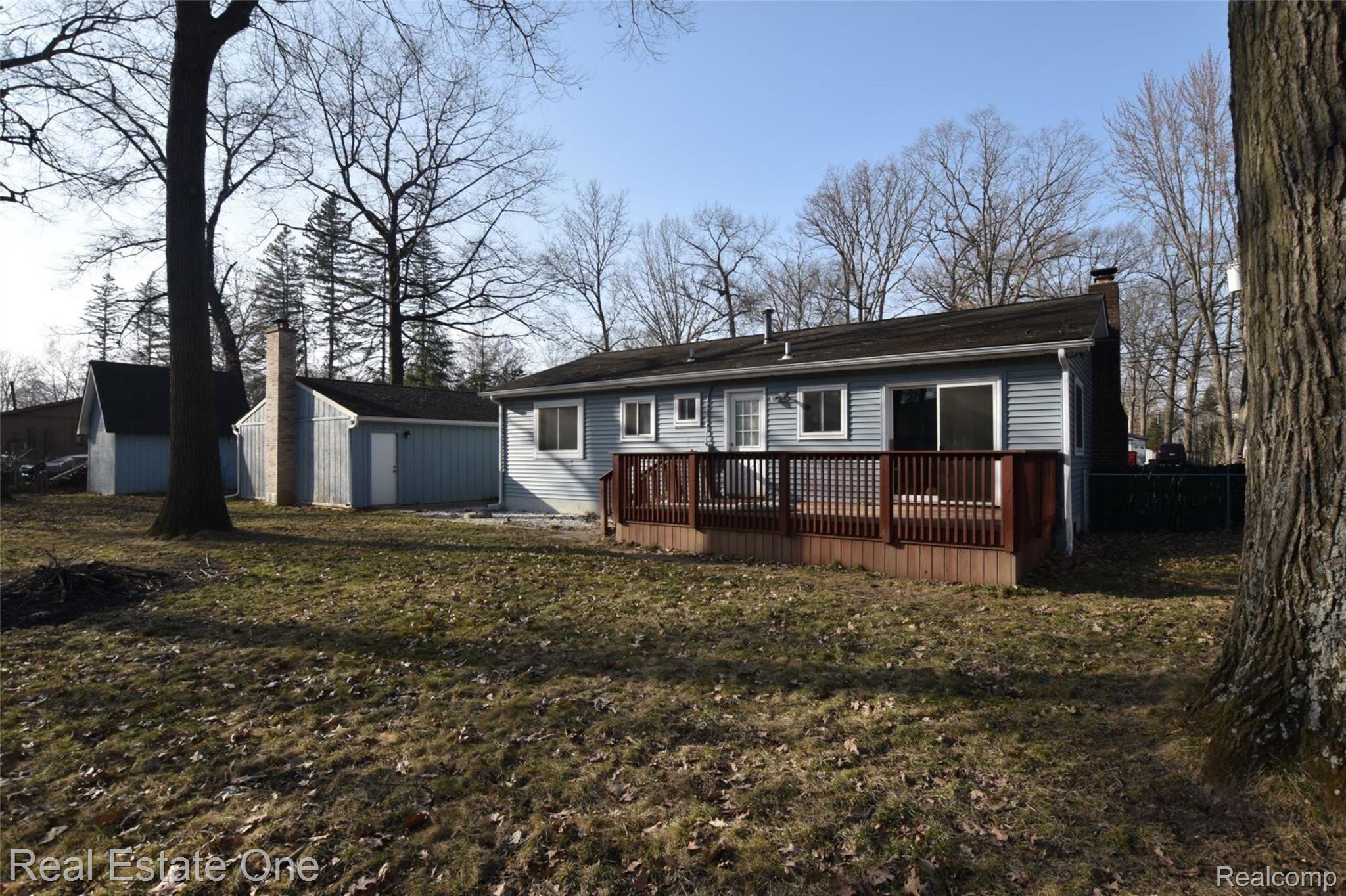 1626 Remsing Street Hartland, MI 48353 - Photo 14 of 17 Backyard, deck