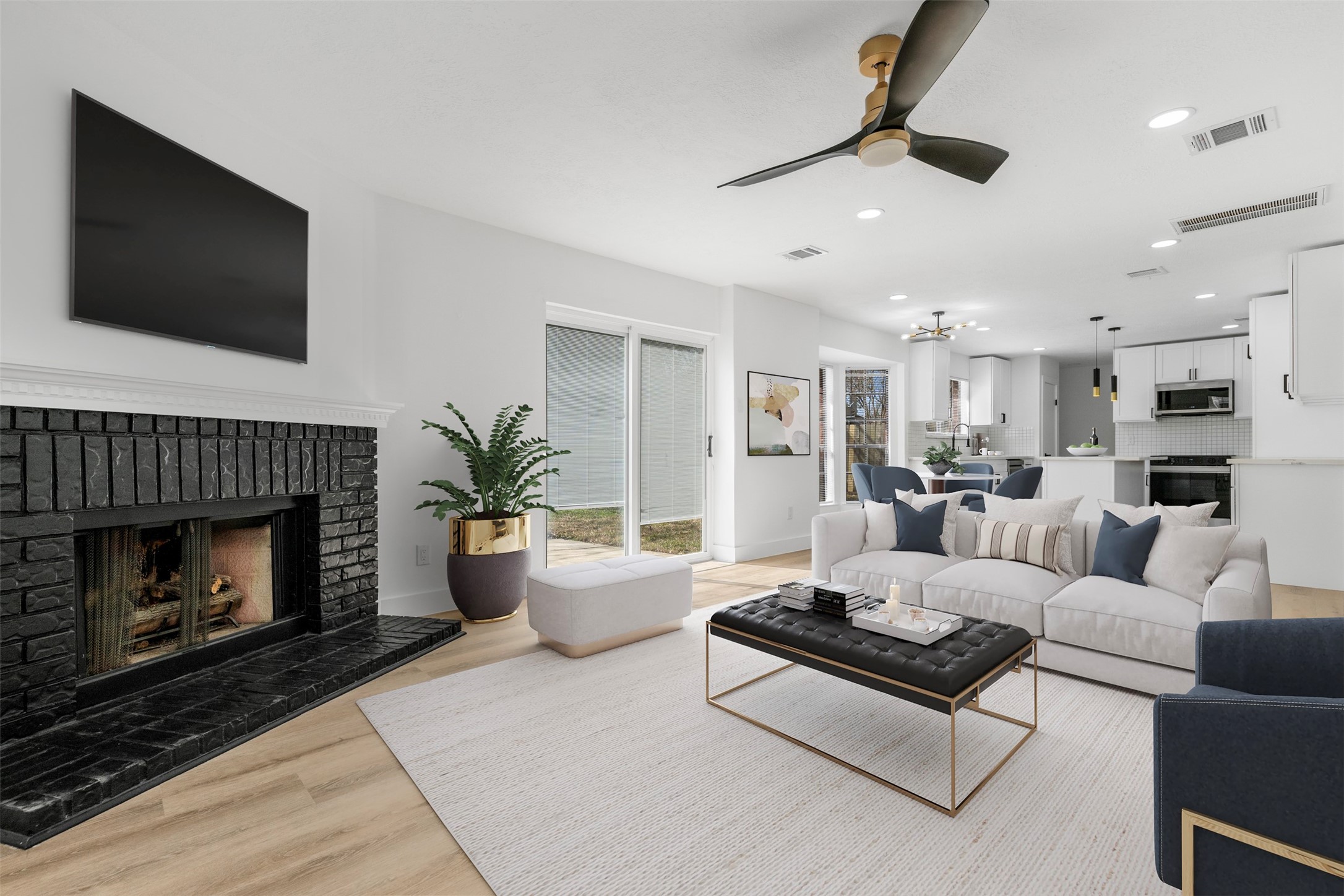 14922 Waybridge Drive Houston, TX 77062 - Photo 1 of 49 a living room with furniture a fireplace and a flat screen tv