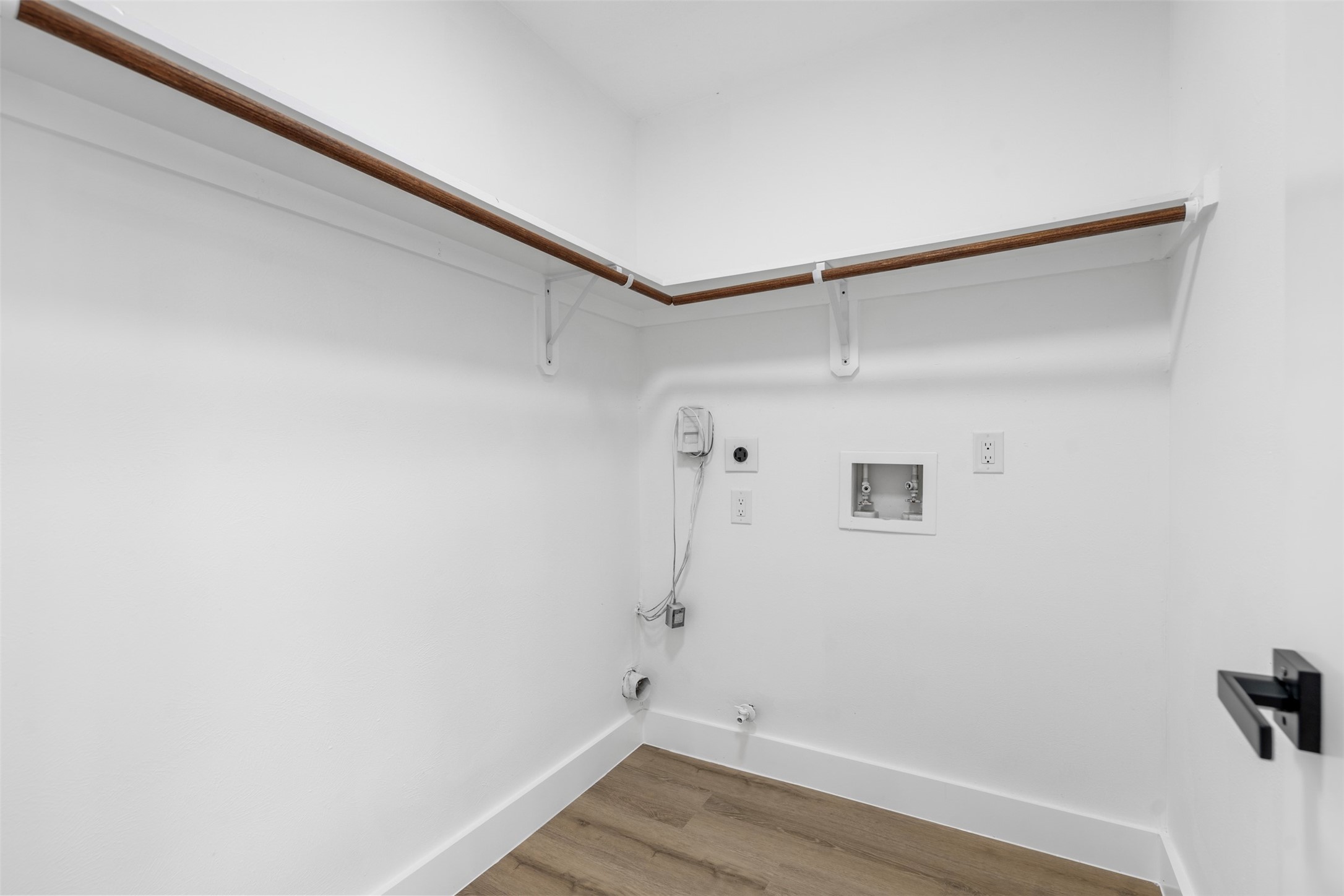 14922 Waybridge Drive Houston, TX 77062 - Photo 23 of 49 a view of a room with wooden floor