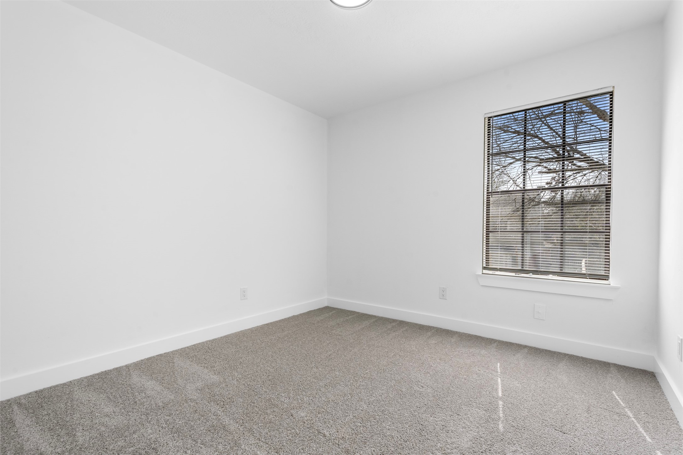 14922 Waybridge Drive Houston, TX 77062 - Photo 31 of 49 an empty room with a window