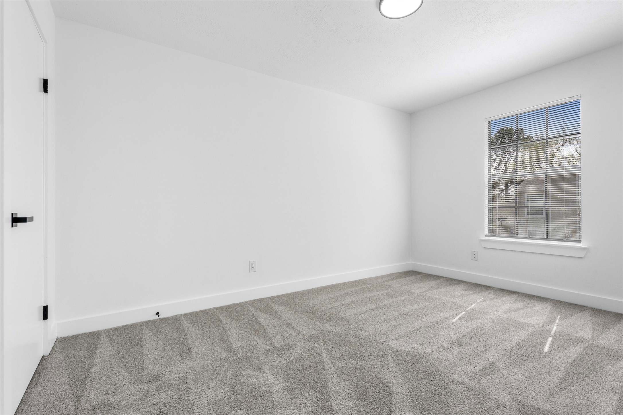 14922 Waybridge Drive Houston, TX 77062 - Photo 34 of 49 an empty room with windows