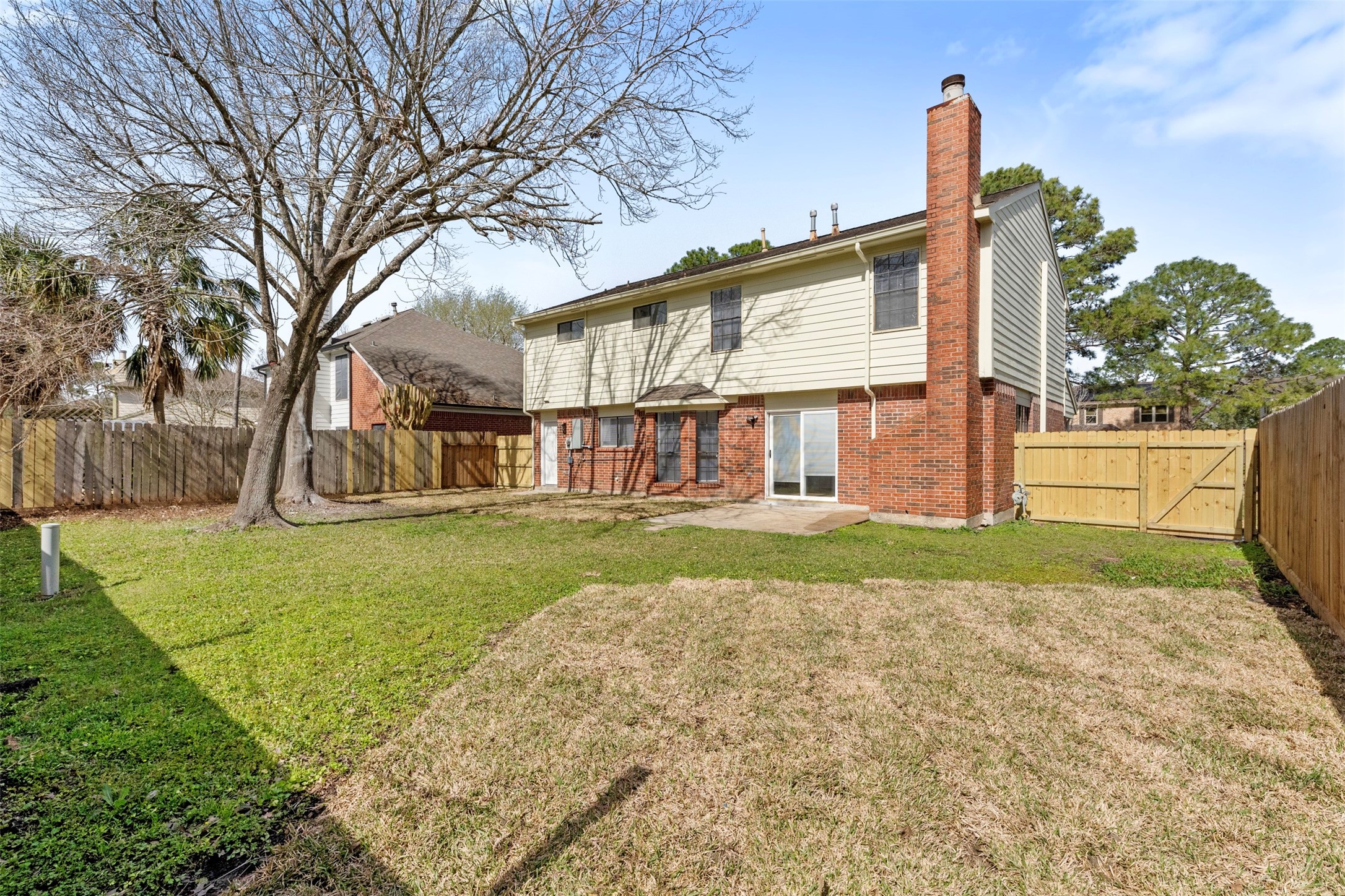 14922 Waybridge Drive Houston, TX 77062 - Photo 42 of 49 a view of a house with a yard and plants