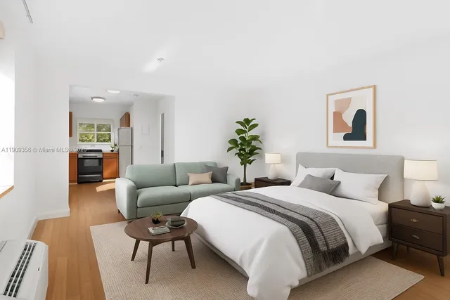 a bedroom with a bed and a couch