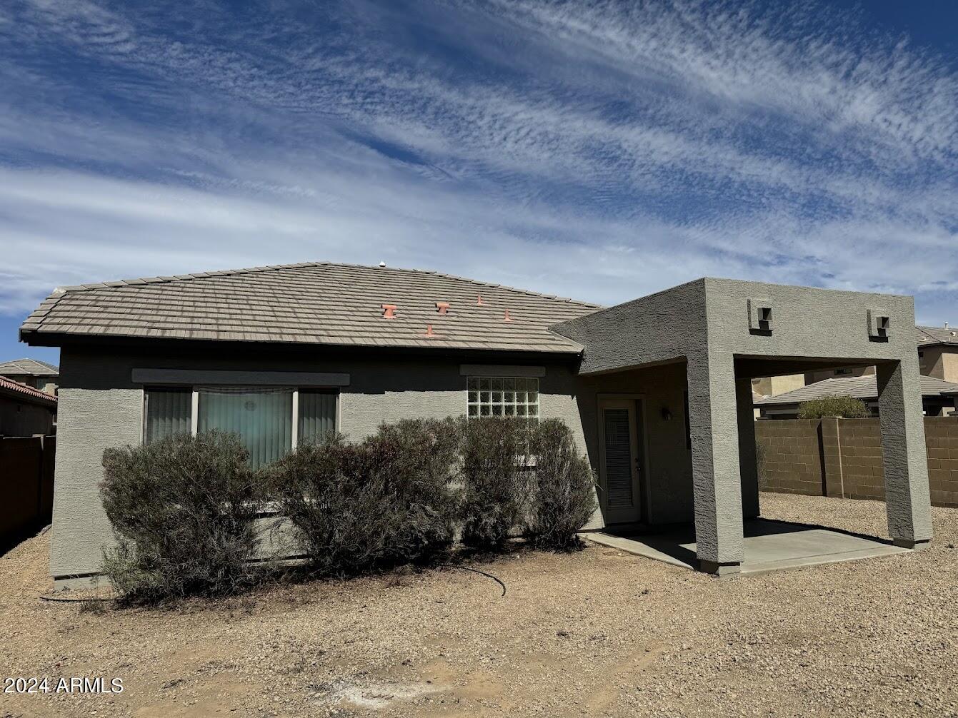 9401 West Berkeley Road Phoenix, AZ 85037 - Photo 26 of 27 a backyard of a house