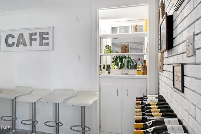 a kitchen with stainless steel appliances a stove and a refrigerator