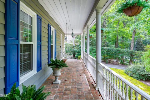 a view of a balcony with garden