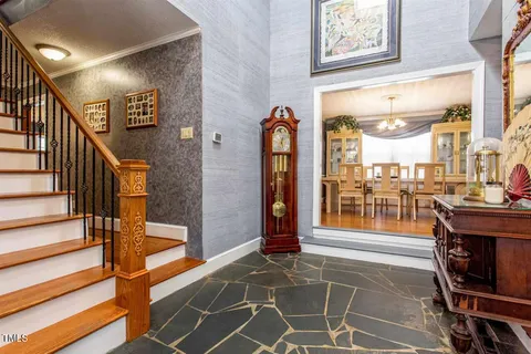 a view of front door with dining area