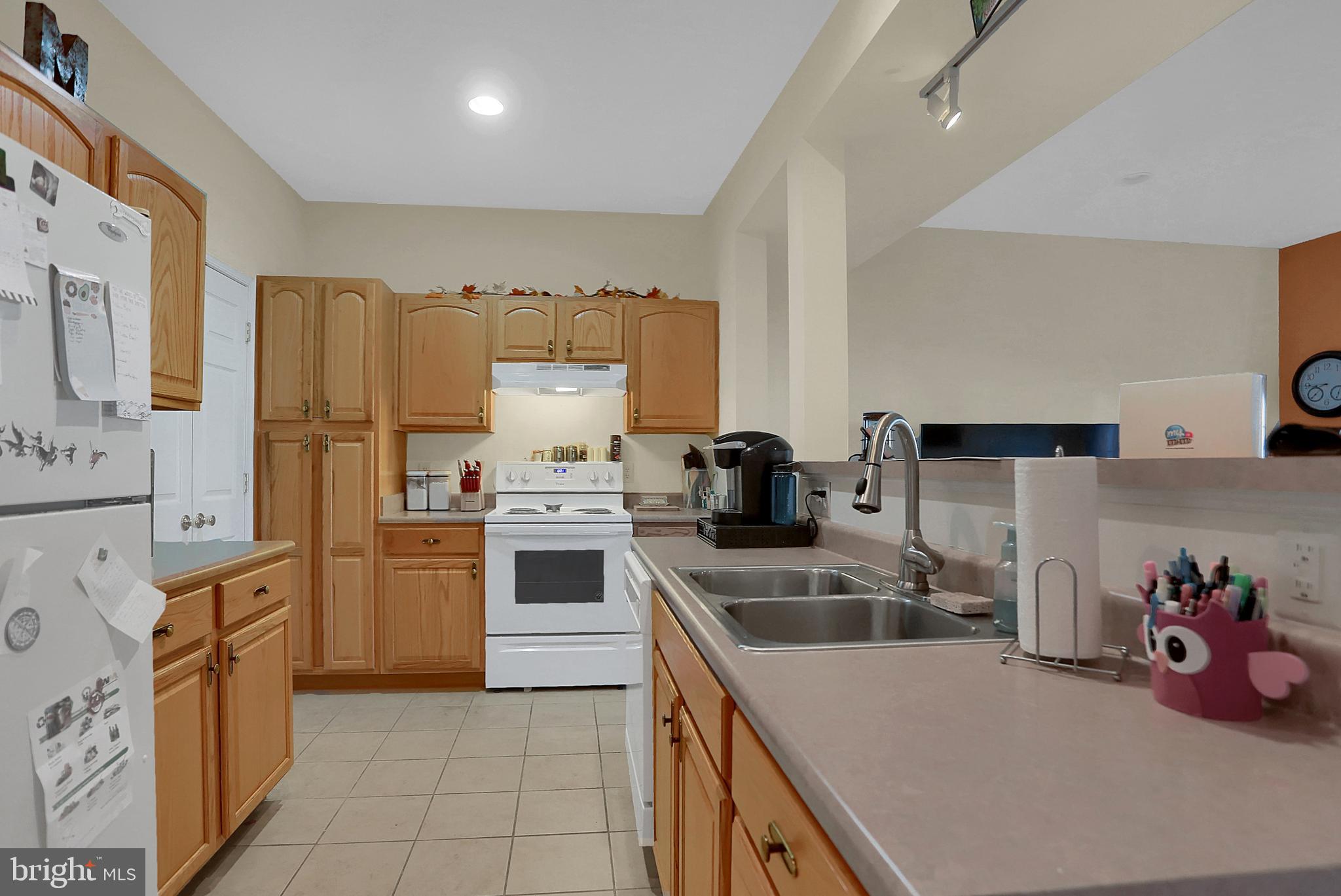 2037 Powell Drive Chambersburg, PA 17201 - Photo 8 of 33 Kitchen view towards laundry room/pantry