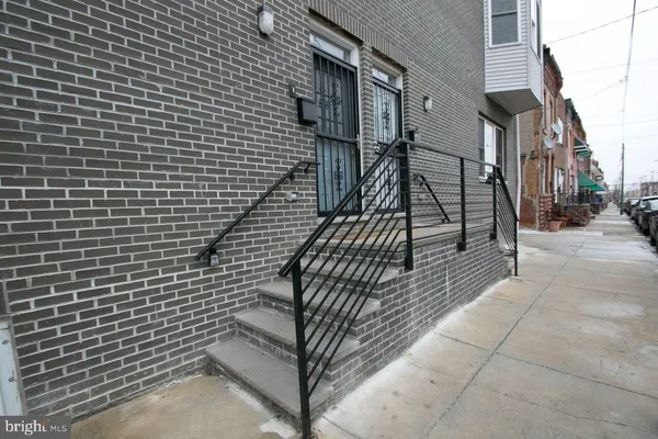 a view of a balcony with wooden floor