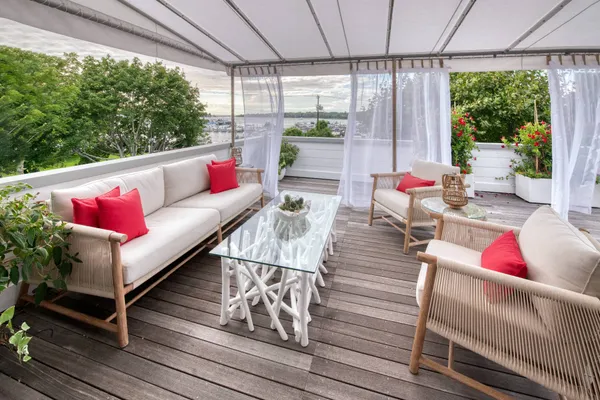 a outdoor living space with furniture and garden view