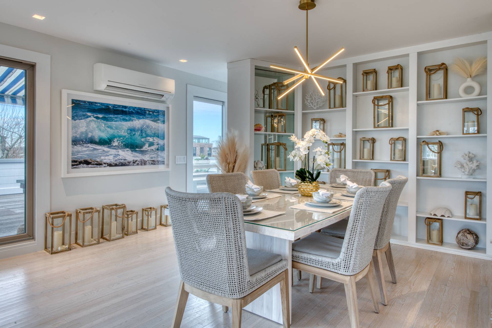 18 Bridge Street Sag Harbor, NY 11963 - Photo 7 of 17 a dining room with furniture a book and wooden floor