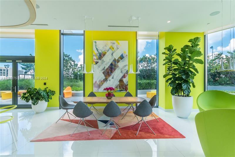 501 Northeast 31st Street, Unit 2204 Miami, FL 33137 - Photo 18 of 26 a living room with furniture and a large window