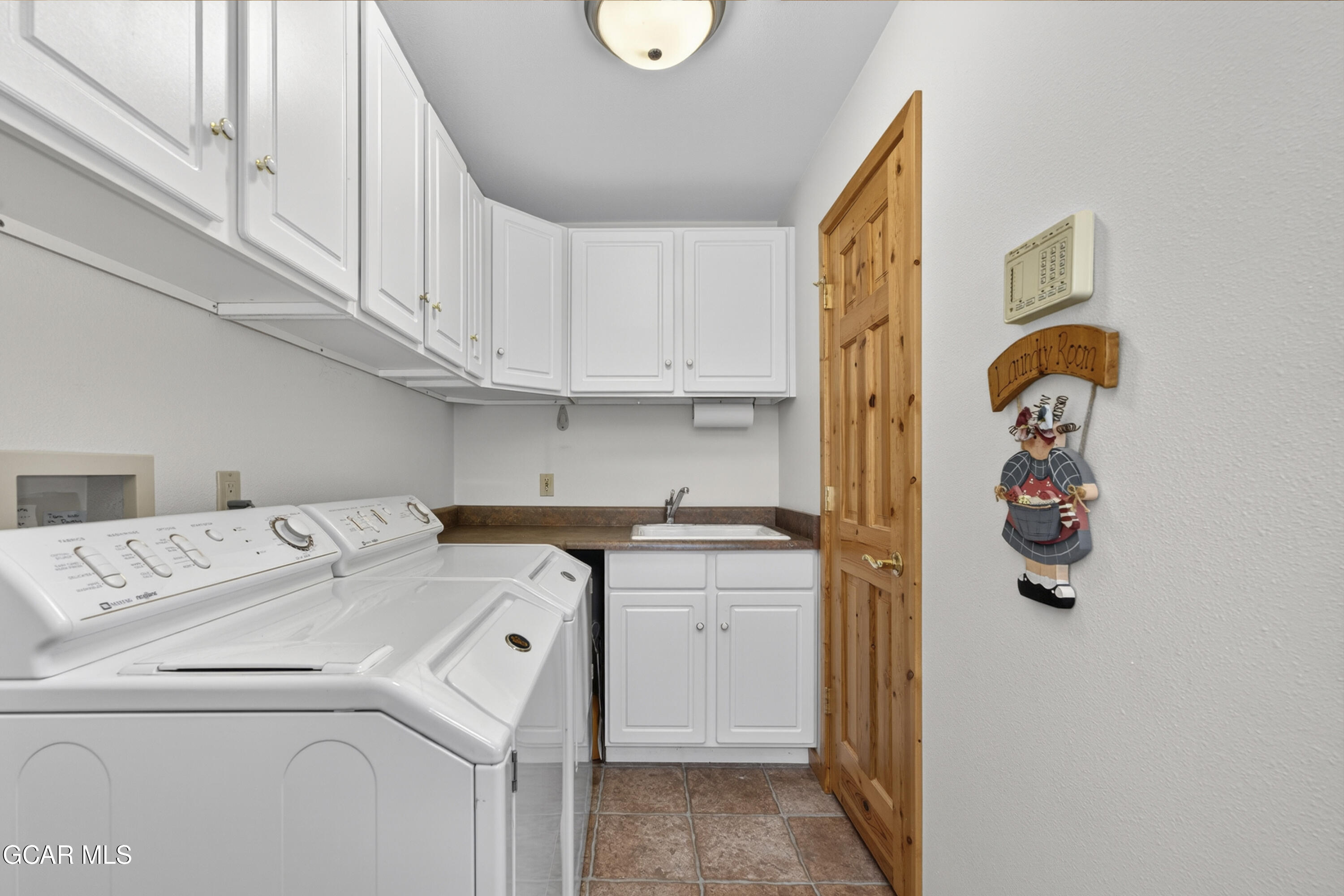400 Ridge Road Tabernash, CO 80478 - Photo 34 of 50 a utility room with dryer and washer