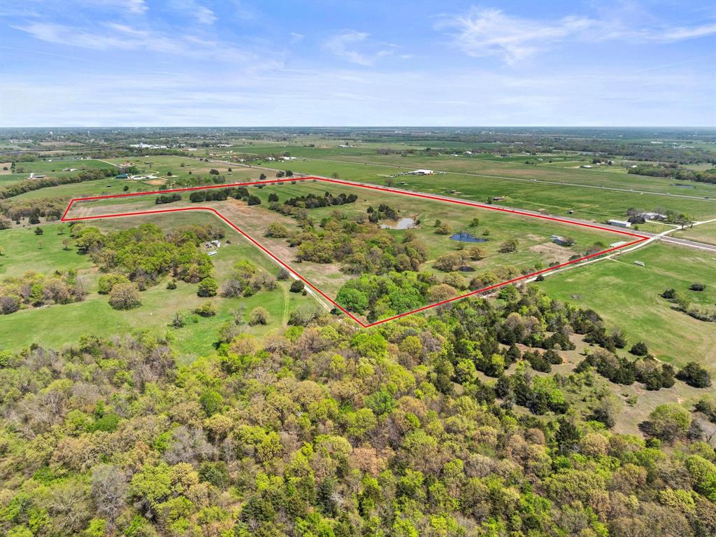 1 Hog Town Road Collinsville, TX 76233 - Photo 5 of 16 a view of an ocean and city
