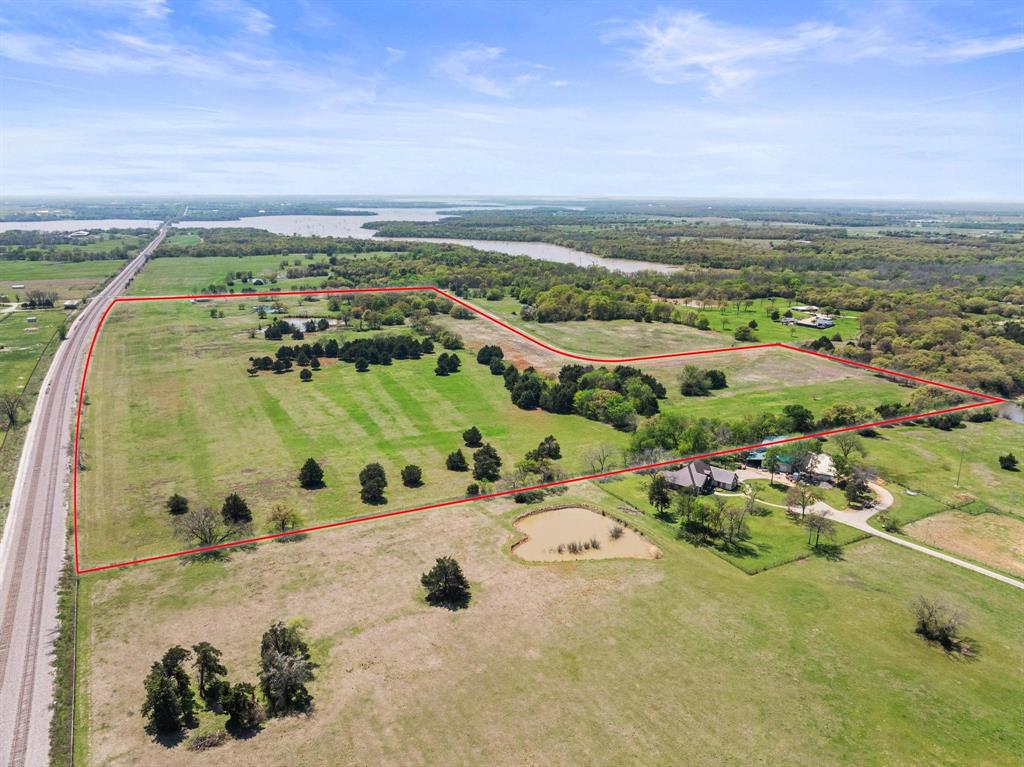 1 Hog Town Road Collinsville, TX 76233 - Photo 8 of 16 an aerial view of a swimming pool
