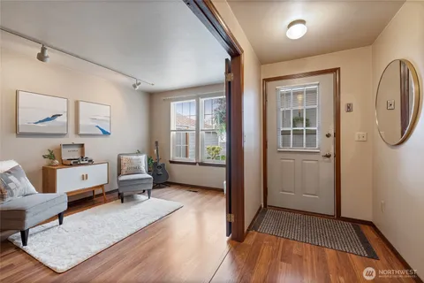 a bedroom with furniture and a window