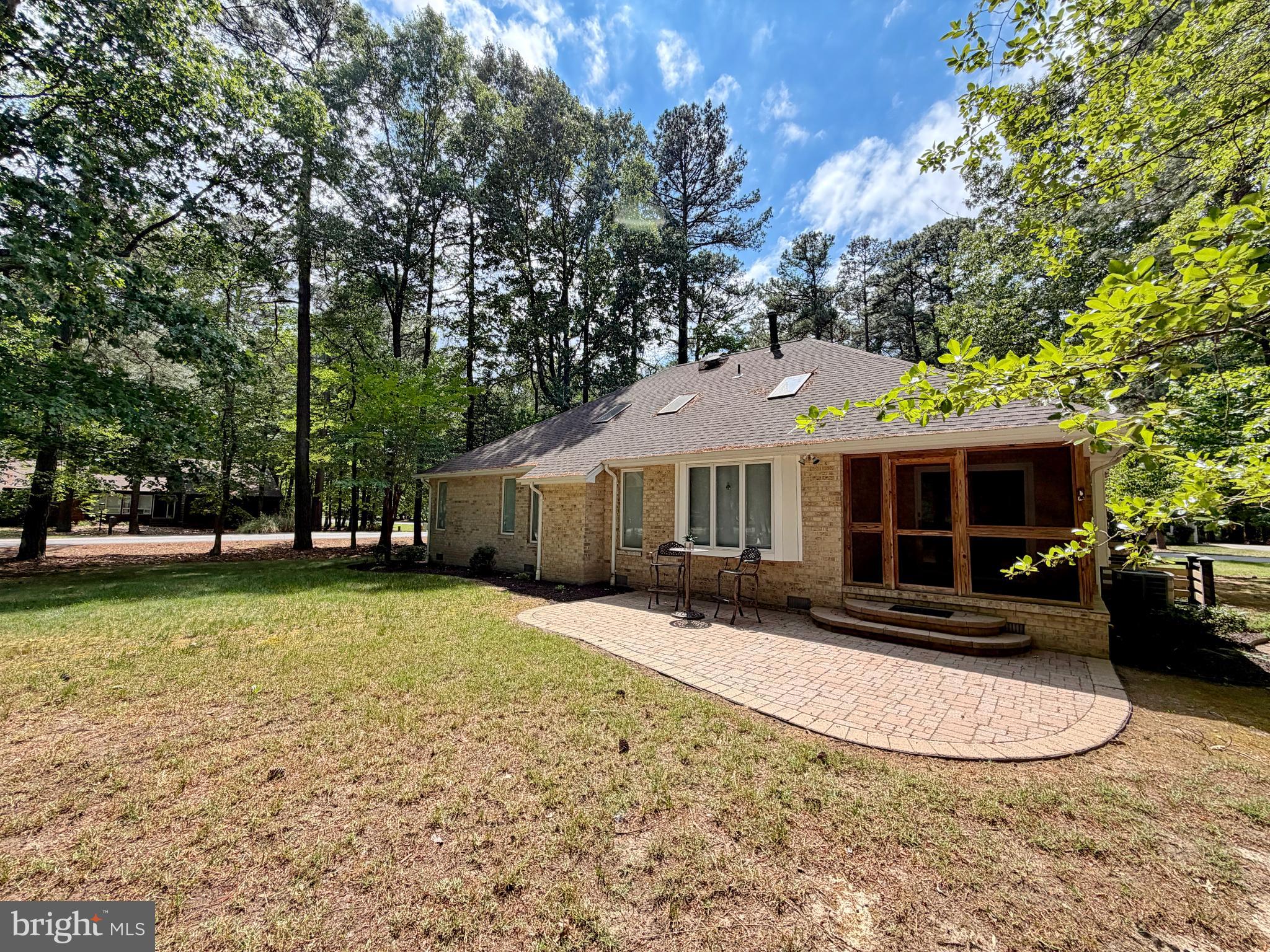 14890 Ivanhoe Court Issue, MD 20645 - Photo 16 of 91 a front view of a house with a yard and garage