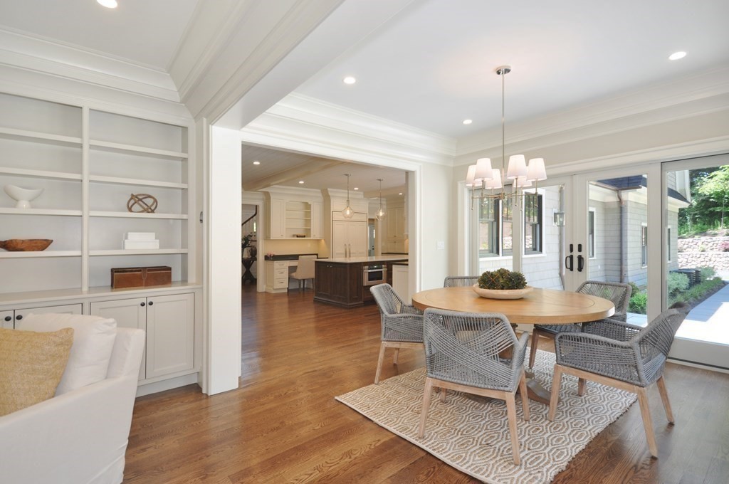 248 Nashawtuc Road Concord, MA 01742 - Photo 11 of 38 a view of a dining room with furniture and wooden floor