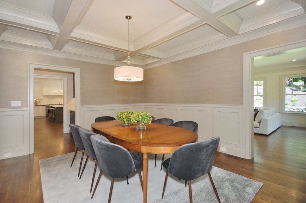 248 Nashawtuc Road Concord, MA 01742 - Photo 13 of 38 a view of a dining room with furniture and wooden floor