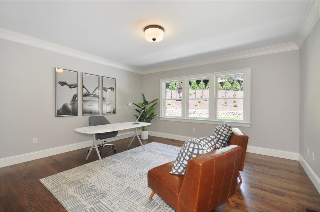 248 Nashawtuc Road Concord, MA 01742 - Photo 14 of 38 a living room with furniture and a window