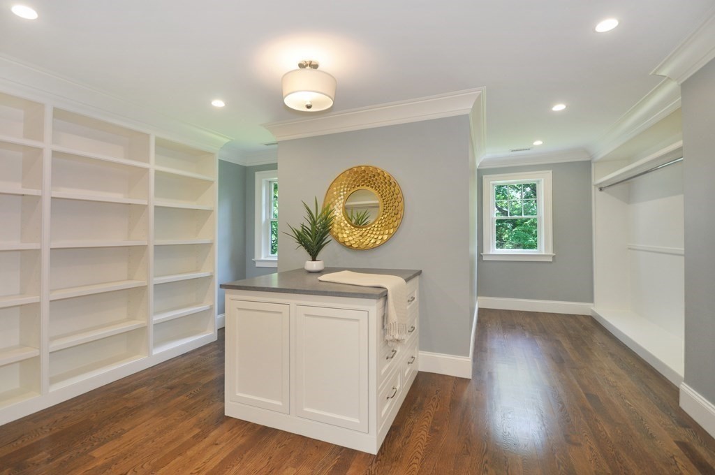 248 Nashawtuc Road Concord, MA 01742 - Photo 17 of 38 a view of a room with wooden floor and window