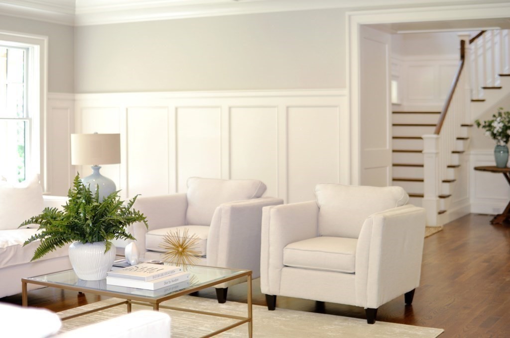 248 Nashawtuc Road Concord, MA 01742 - Photo 25 of 38 a living room with furniture and a large window