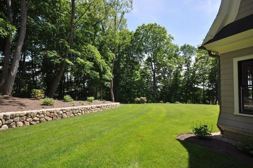 248 Nashawtuc Road Concord, MA 01742 - Photo 30 of 38 a view of a garden with plants