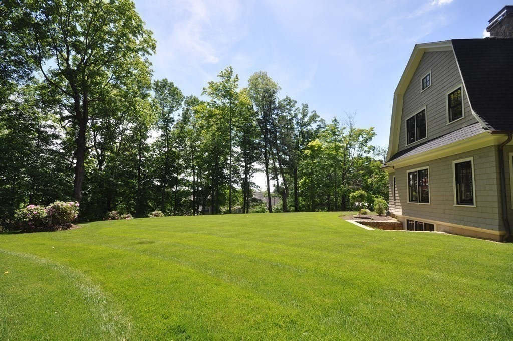 248 Nashawtuc Road Concord, MA 01742 - Photo 31 of 38 a view of outdoor space with garden and tree