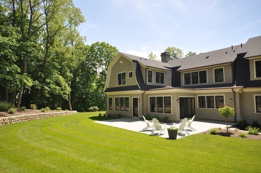 248 Nashawtuc Road Concord, MA 01742 - Photo 32 of 38 a front view of a house with swimming pool