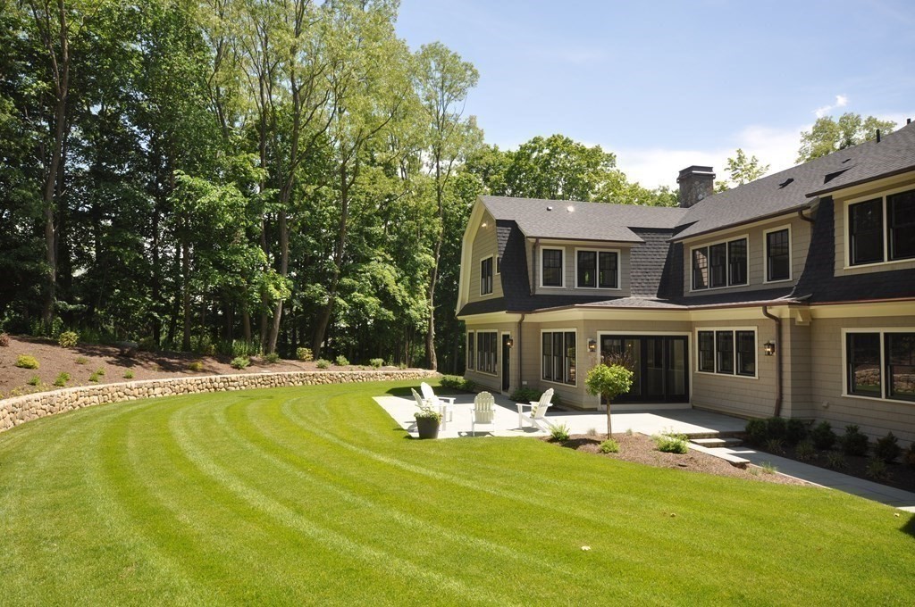 248 Nashawtuc Road Concord, MA 01742 - Photo 33 of 38 a front view of a house with swimming pool