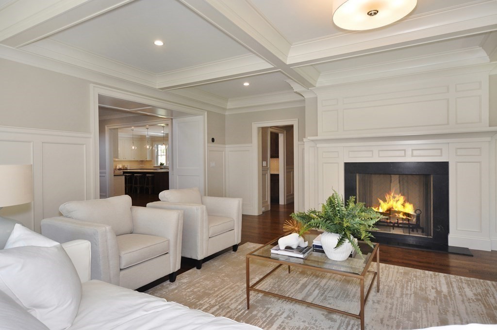 248 Nashawtuc Road Concord, MA 01742 - Photo 6 of 38 a living room with furniture and a fireplace