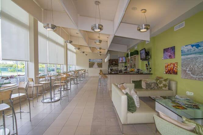250 Sands Point Road, Unit 5203 Longboat Key, FL 34228 - Photo 30 of 32 a lobby with furniture and view of living room
