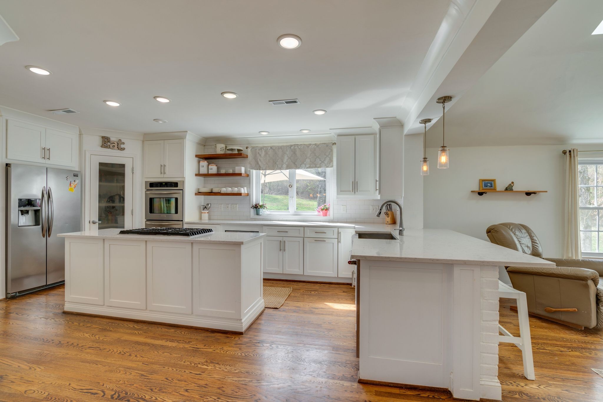 745 Elysian Fields Road Nashville, TN 37204 - Photo 12 of 60 a kitchen with white cabinets and sink