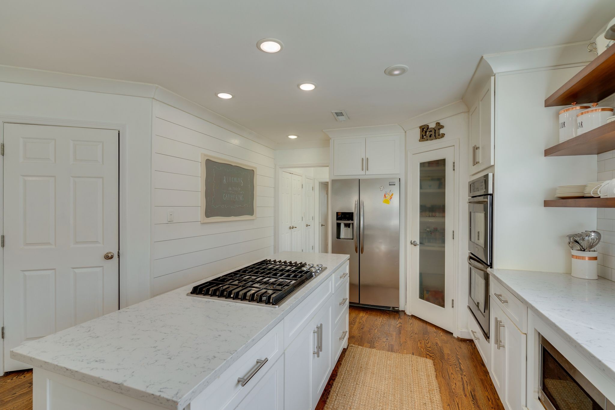 745 Elysian Fields Road Nashville, TN 37204 - Photo 14 of 60 a kitchen with stainless steel appliances a refrigerator and a stove top oven