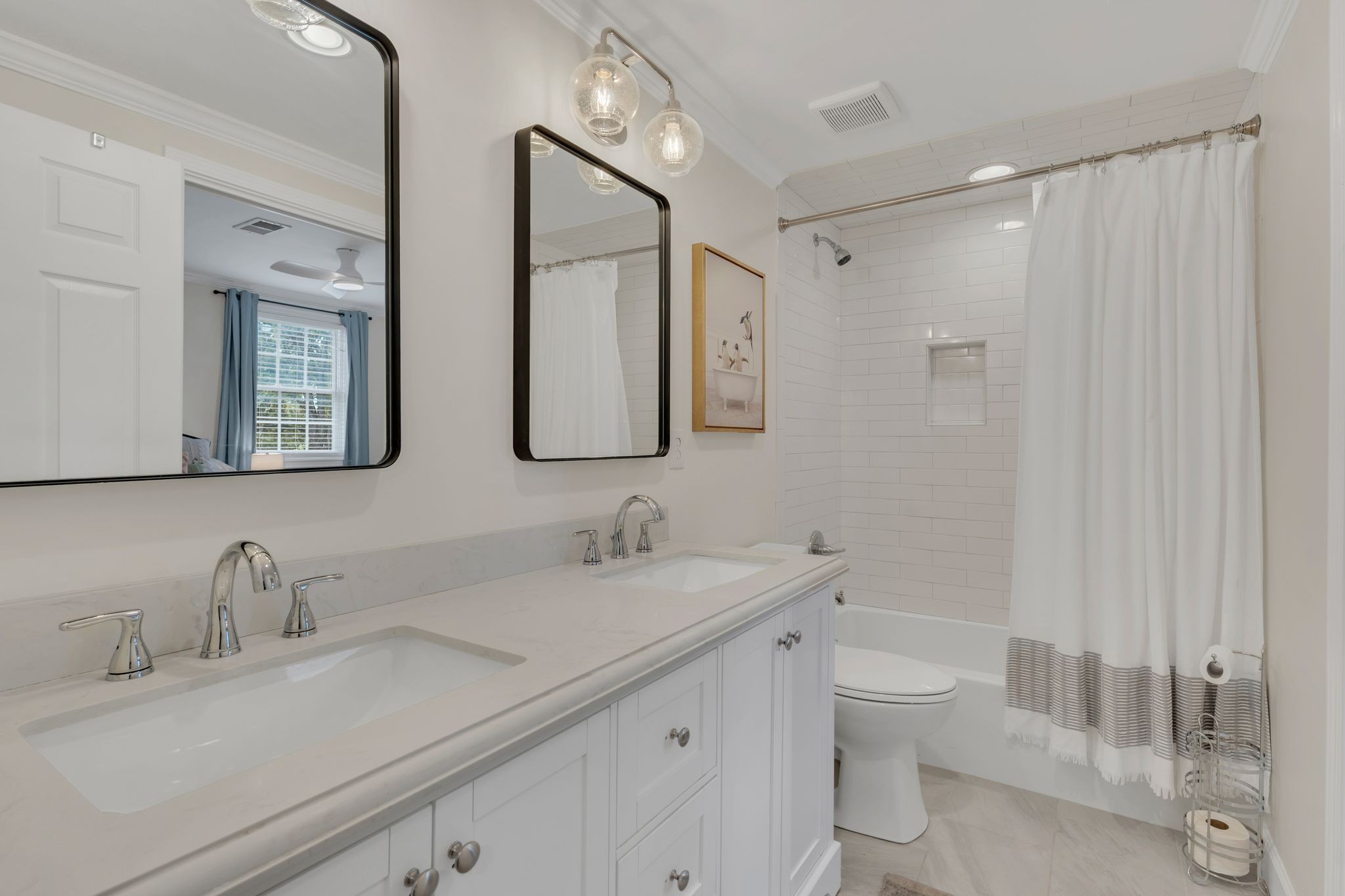 745 Elysian Fields Road Nashville, TN 37204 - Photo 25 of 60 a bathroom with a double vanity sink mirror and toilet