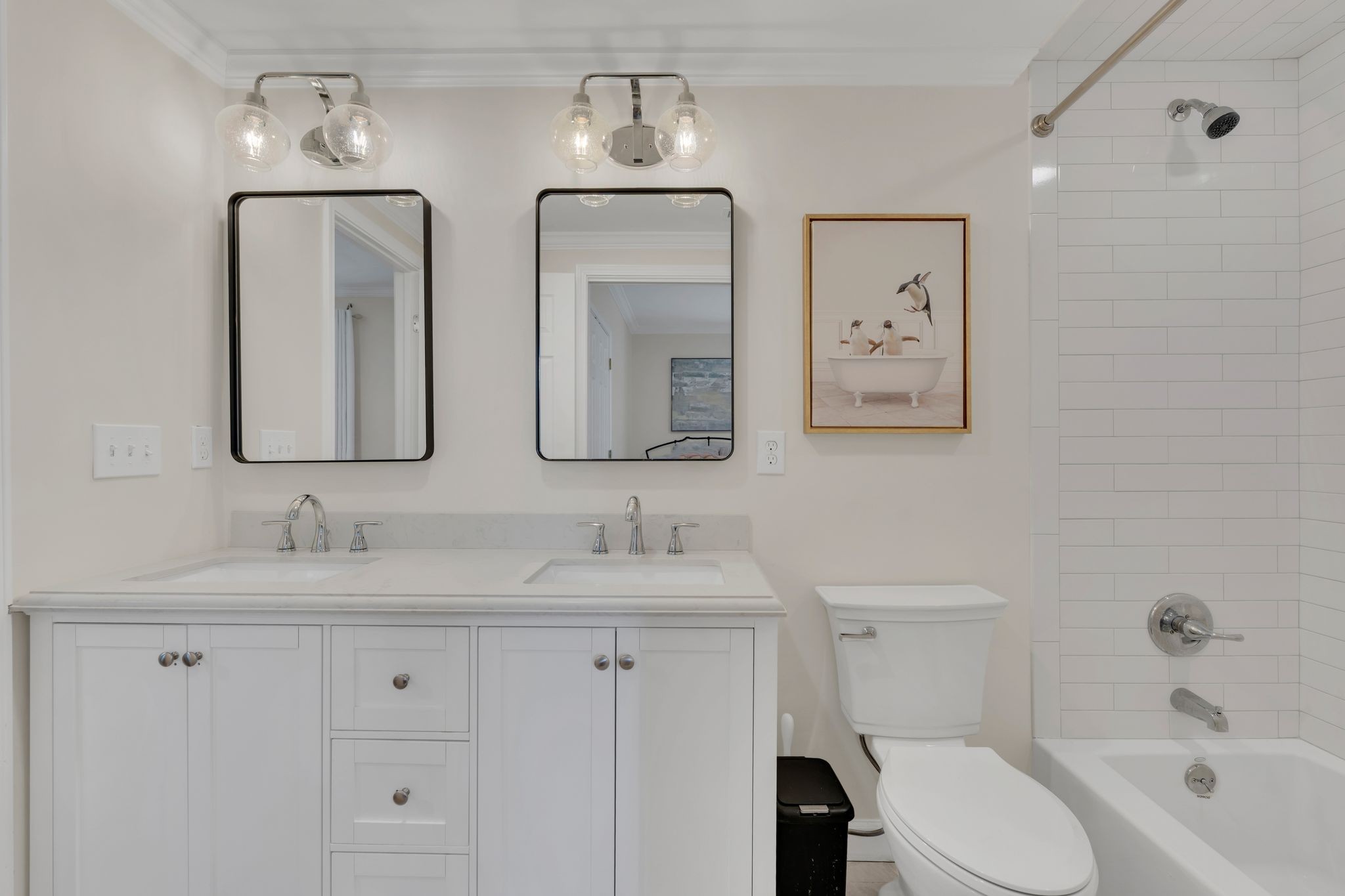 745 Elysian Fields Road Nashville, TN 37204 - Photo 26 of 60 a bathroom with double vanity sink and a bathtub