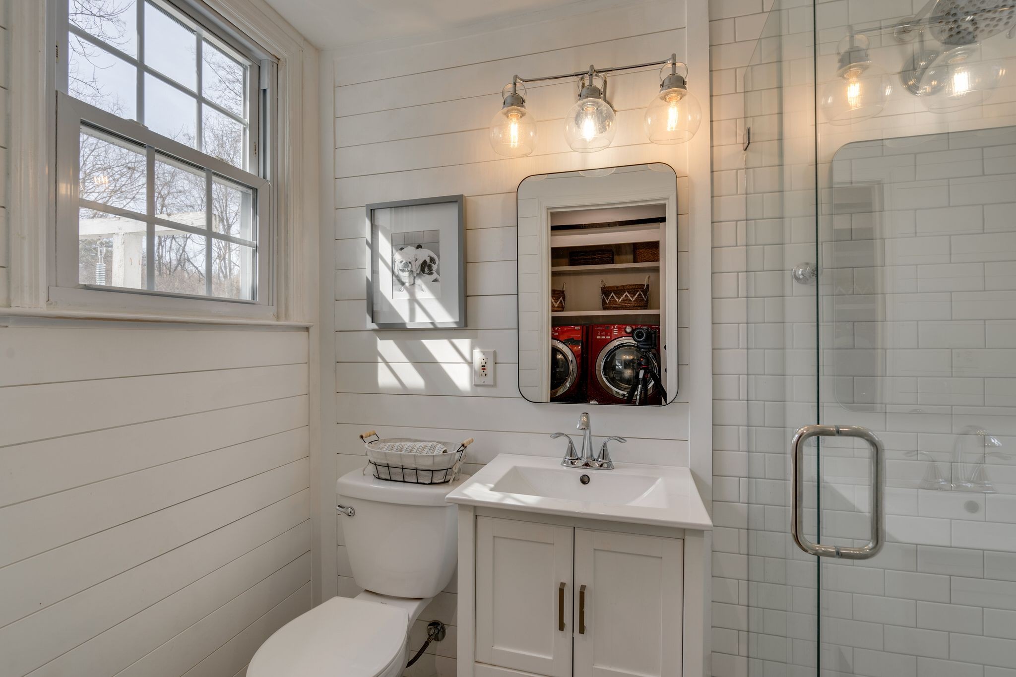 745 Elysian Fields Road Nashville, TN 37204 - Photo 28 of 60 a bathroom with a toilet sink and mirror
