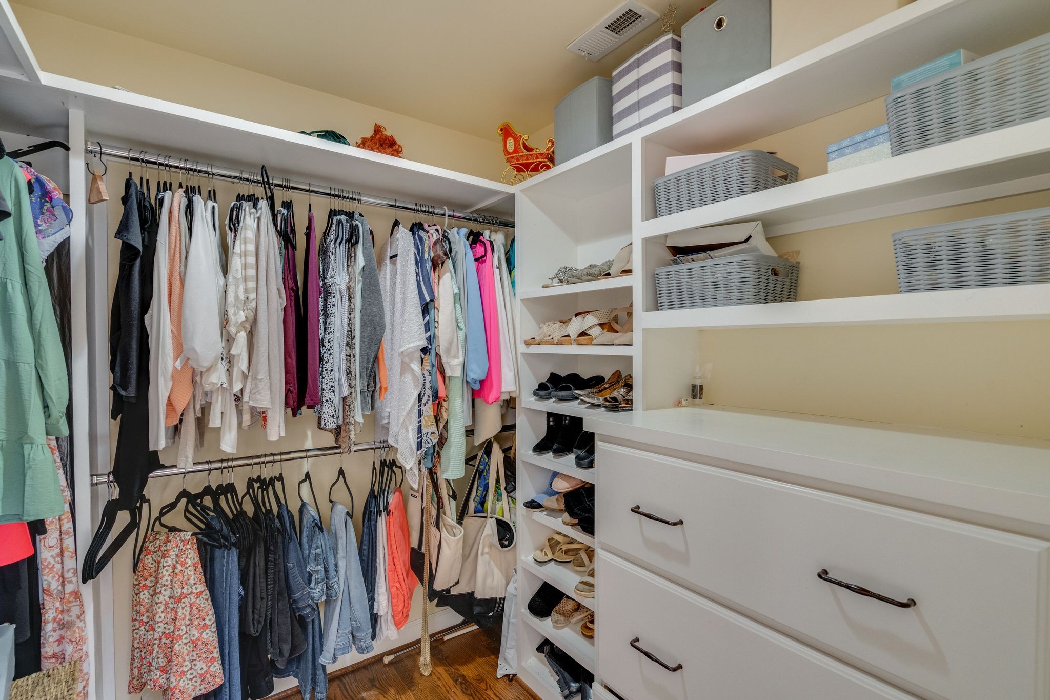745 Elysian Fields Road Nashville, TN 37204 - Photo 34 of 60 a view of walk in closet with clothes and shoes