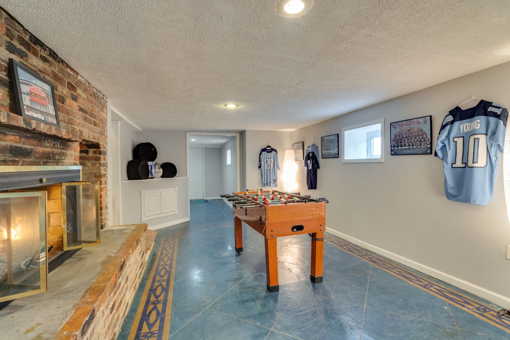 745 Elysian Fields Road Nashville, TN 37204 - Photo 38 of 60 a living room with furniture a flat screen tv and a refrigerator