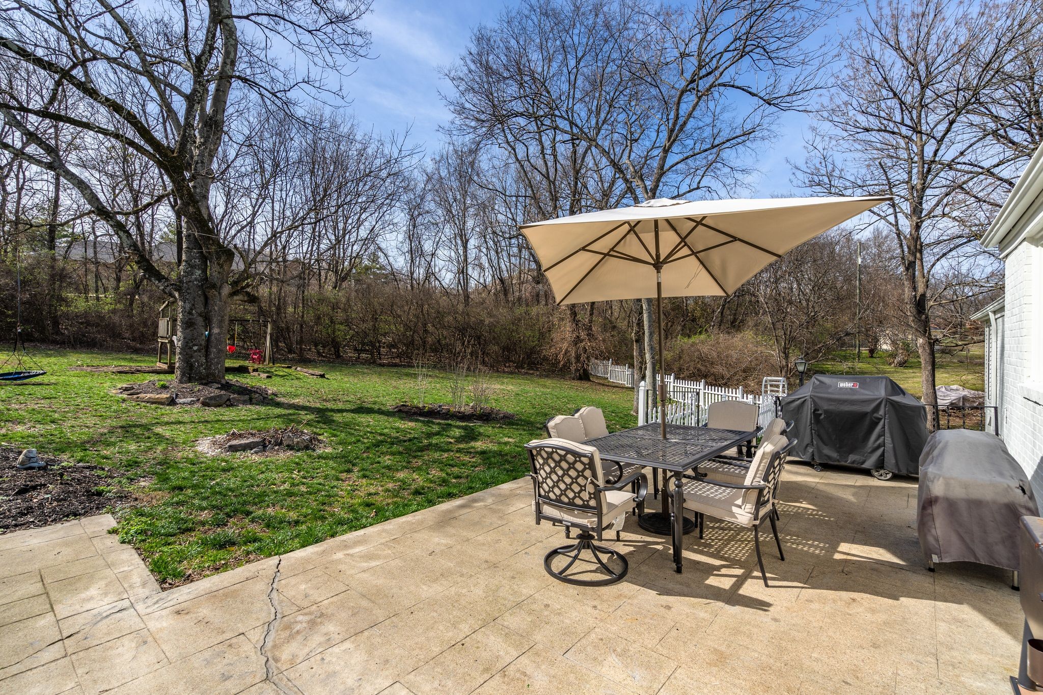 745 Elysian Fields Road Nashville, TN 37204 - Photo 40 of 60 a view of a chairs and table in the yard