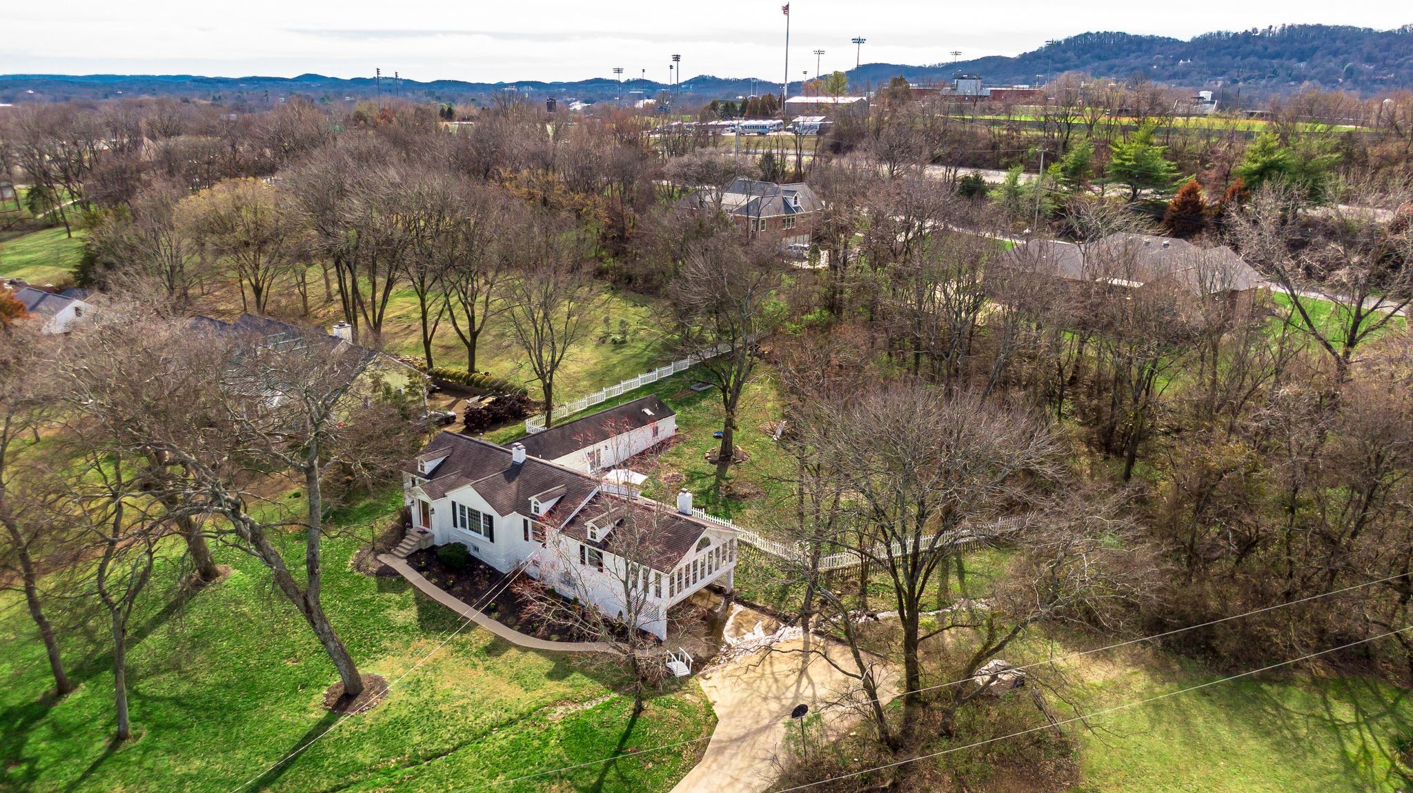 745 Elysian Fields Road Nashville, TN 37204 - Photo 60 of 60 a view of a lush green forest with mountains in the background