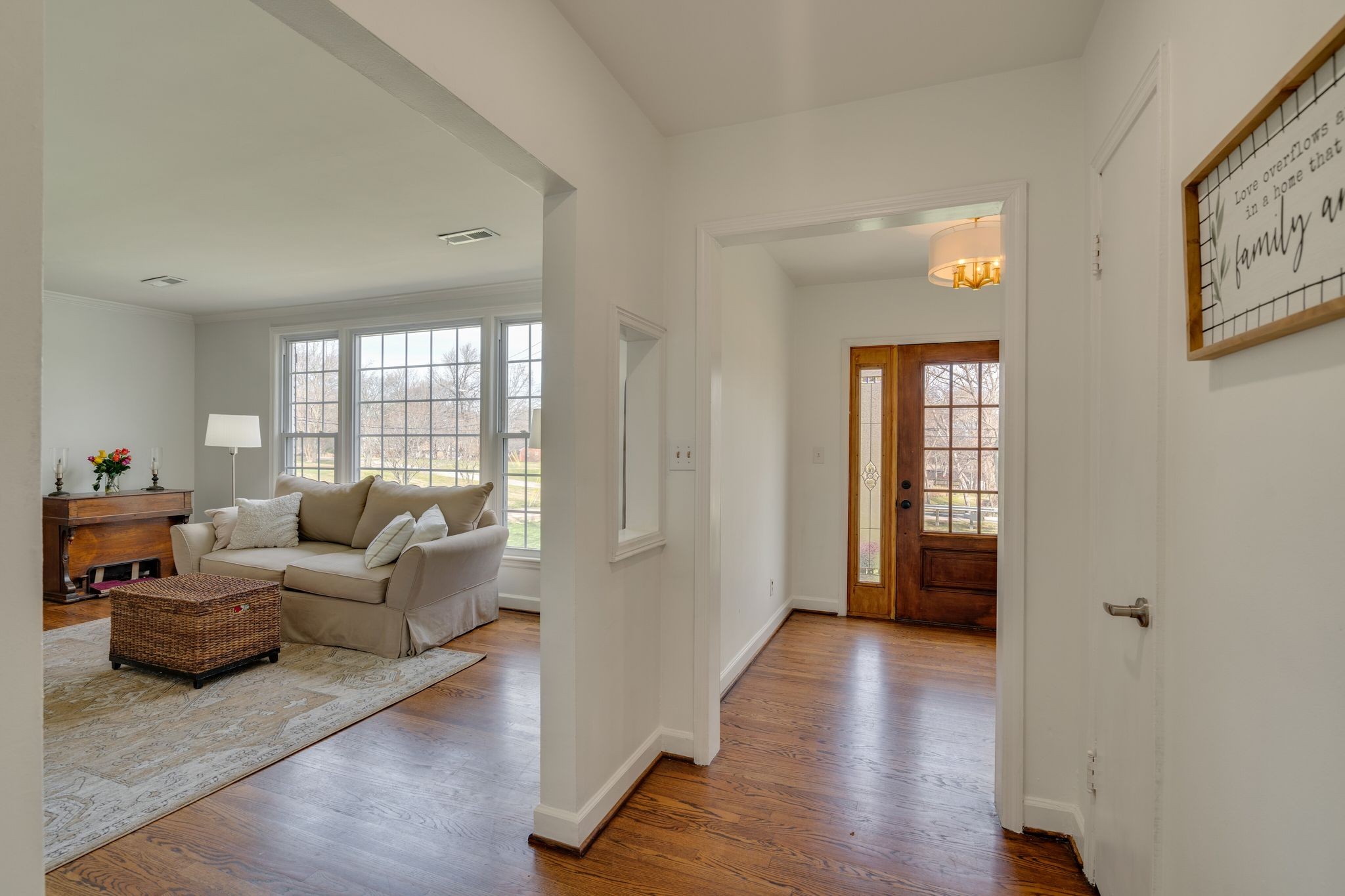 745 Elysian Fields Road Nashville, TN 37204 - Photo 7 of 60 a living room with furniture and a wooden floor