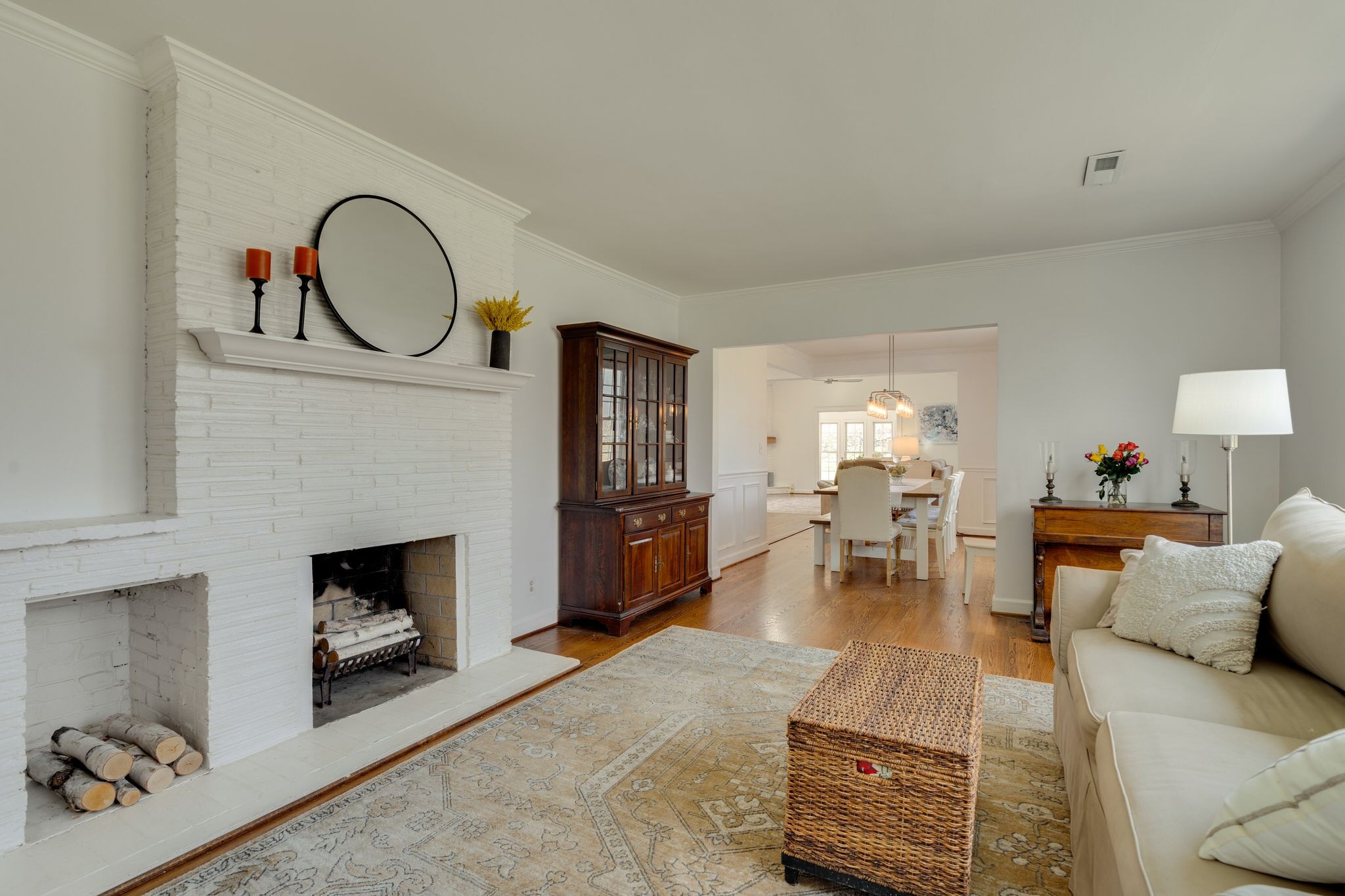 745 Elysian Fields Road Nashville, TN 37204 - Photo 8 of 60 a living room with furniture a rug and a fireplace