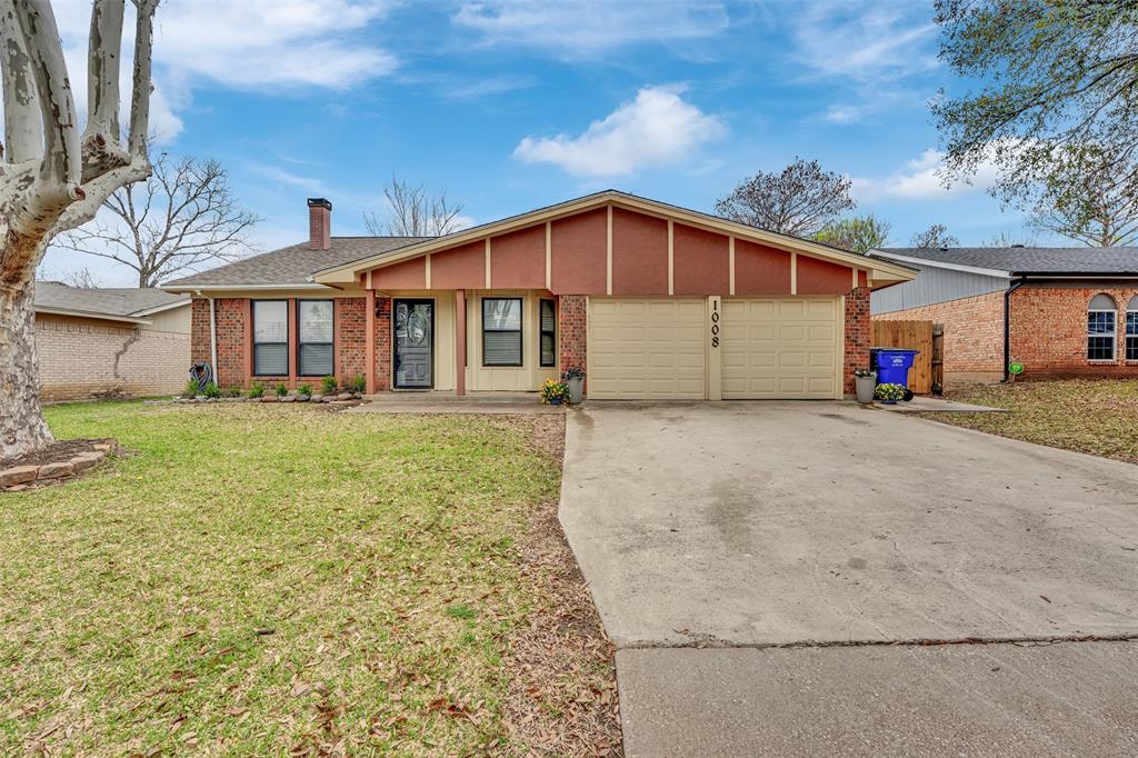 1008 Kay Lynn Street Mansfield, TX 76063 - Photo 1 of 21 a front view of a house with a yard and garage