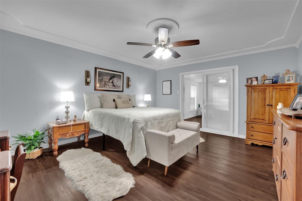 1008 Kay Lynn Street Mansfield, TX 76063 - Photo 14 of 21 a bedroom with a bed and wooden floor