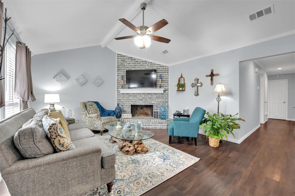 1008 Kay Lynn Street Mansfield, TX 76063 - Photo 3 of 21 a living room with furniture fireplace and a fireplace